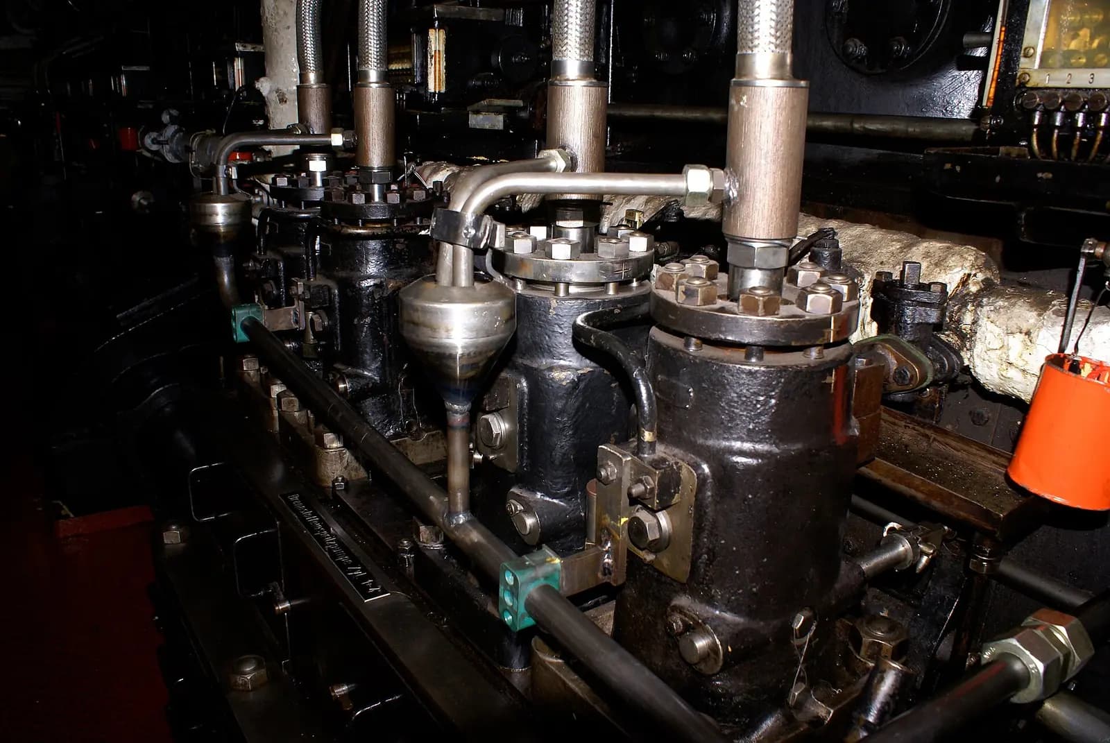 Close view of a large diesel engine fuel and cylinder assembly